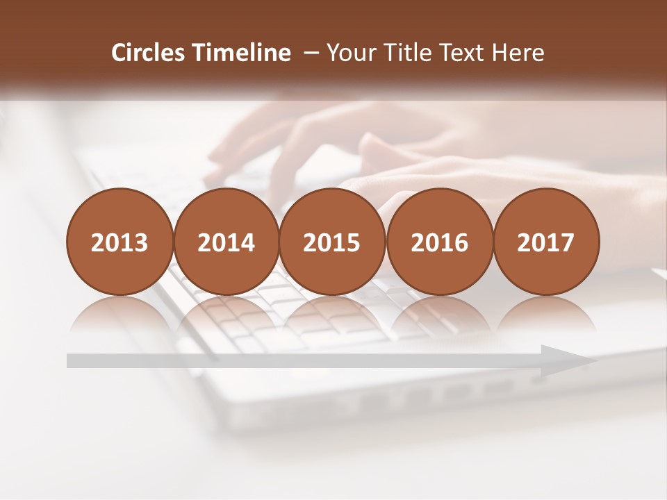 A Person Typing On A Laptop Computer PowerPoint Template