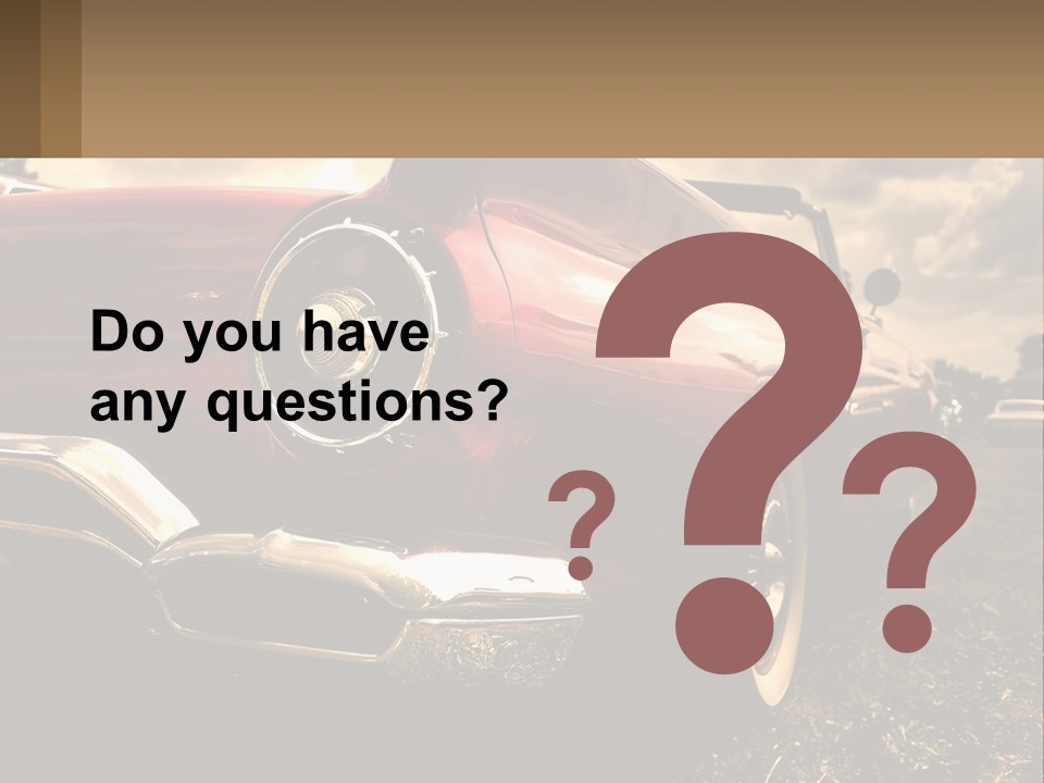 A Red Car Is Parked On The Grass PowerPoint Template