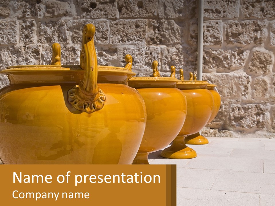 A Group Of Yellow Vases Sitting On Top Of A Sidewalk PowerPoint Template