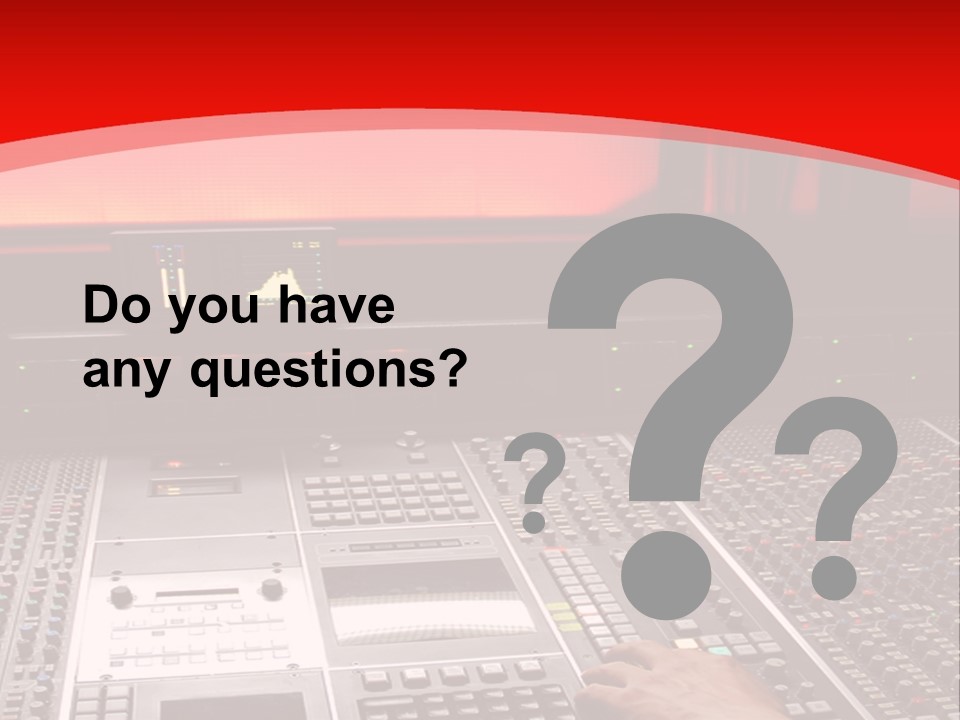 A Man Is Working On A Sound Board PowerPoint Template