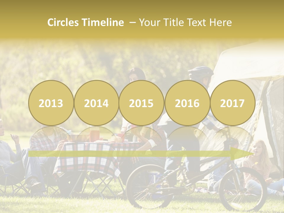 A Group Of People Sitting Around A Tent PowerPoint Template