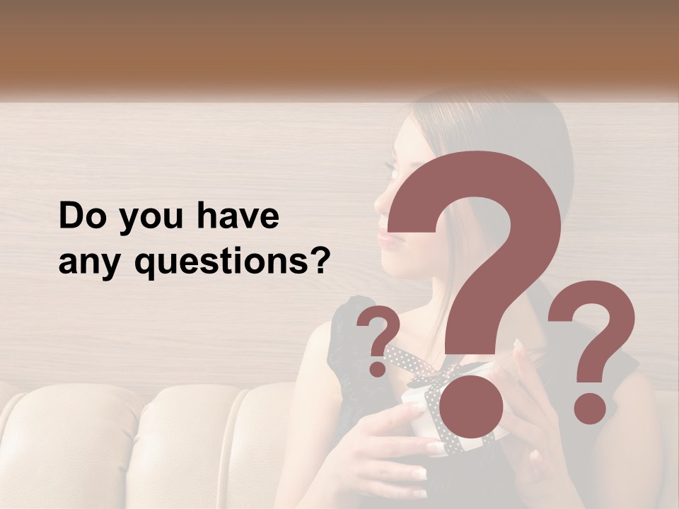 A Woman Sitting On A Couch With Her Hand On Her Chest PowerPoint Template
