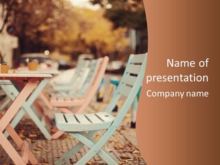A Table And Chairs With A Cup Of Coffee On It PowerPoint Template
