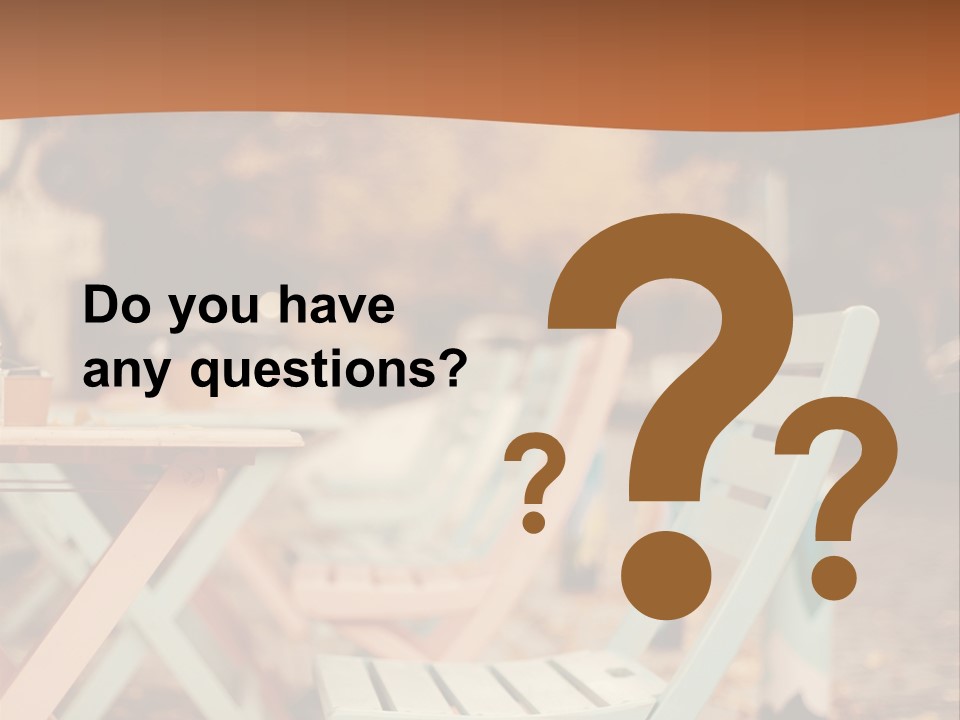 A Table And Chairs With A Cup Of Coffee On It PowerPoint Template