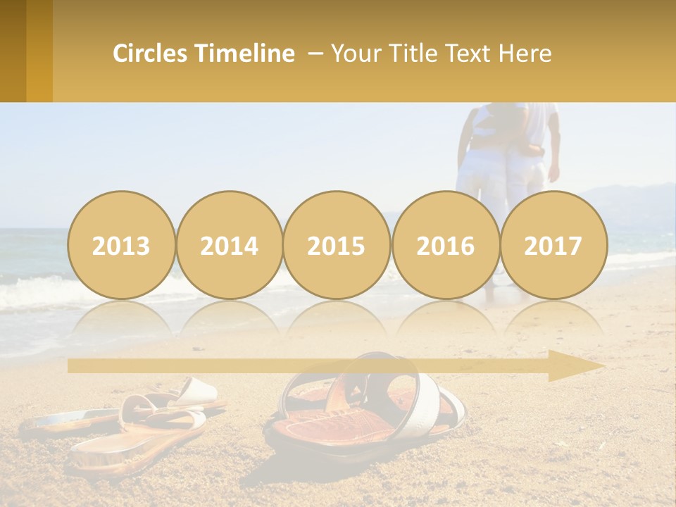 A Couple Of People Standing On Top Of A Sandy Beach PowerPoint Template