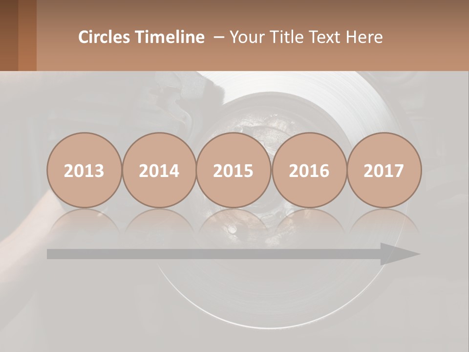 A Man Is Changing A Brake On A Car PowerPoint Template