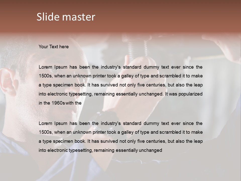 A Man Working On A Car In A Garage PowerPoint Template