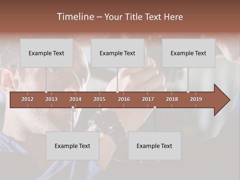 A Man Working On A Car In A Garage PowerPoint Template