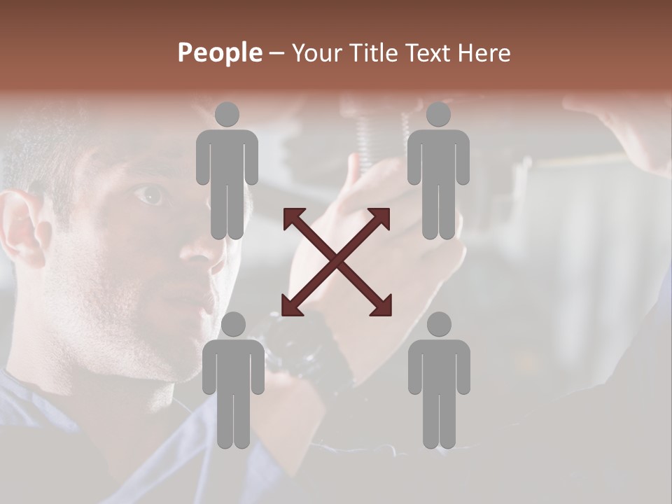 A Man Working On A Car In A Garage PowerPoint Template
