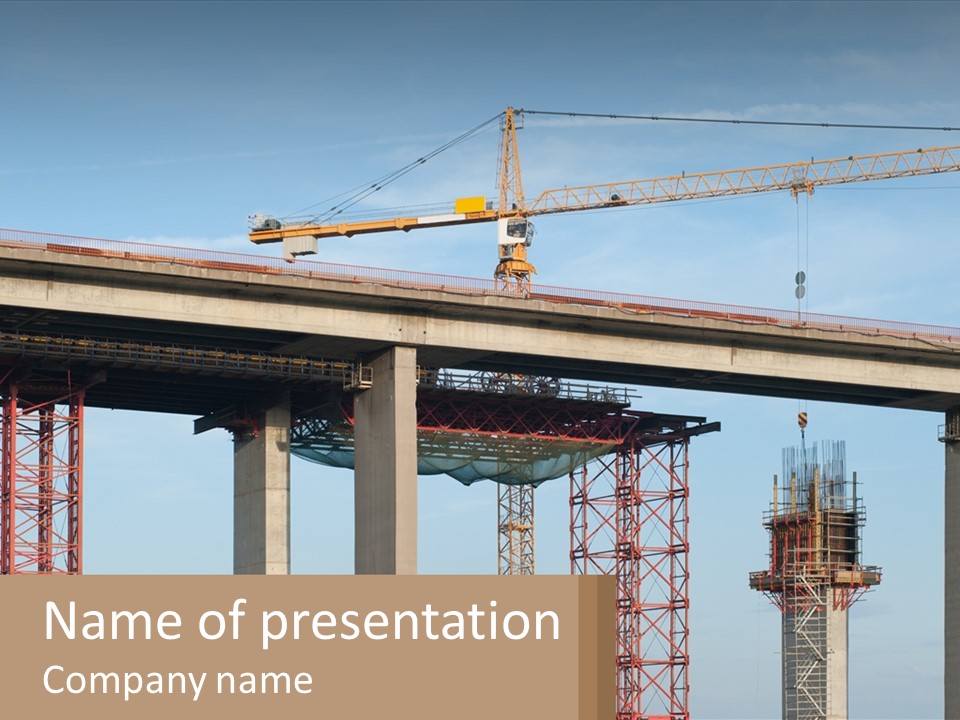 A Crane Is On Top Of A Building Under Construction PowerPoint Template