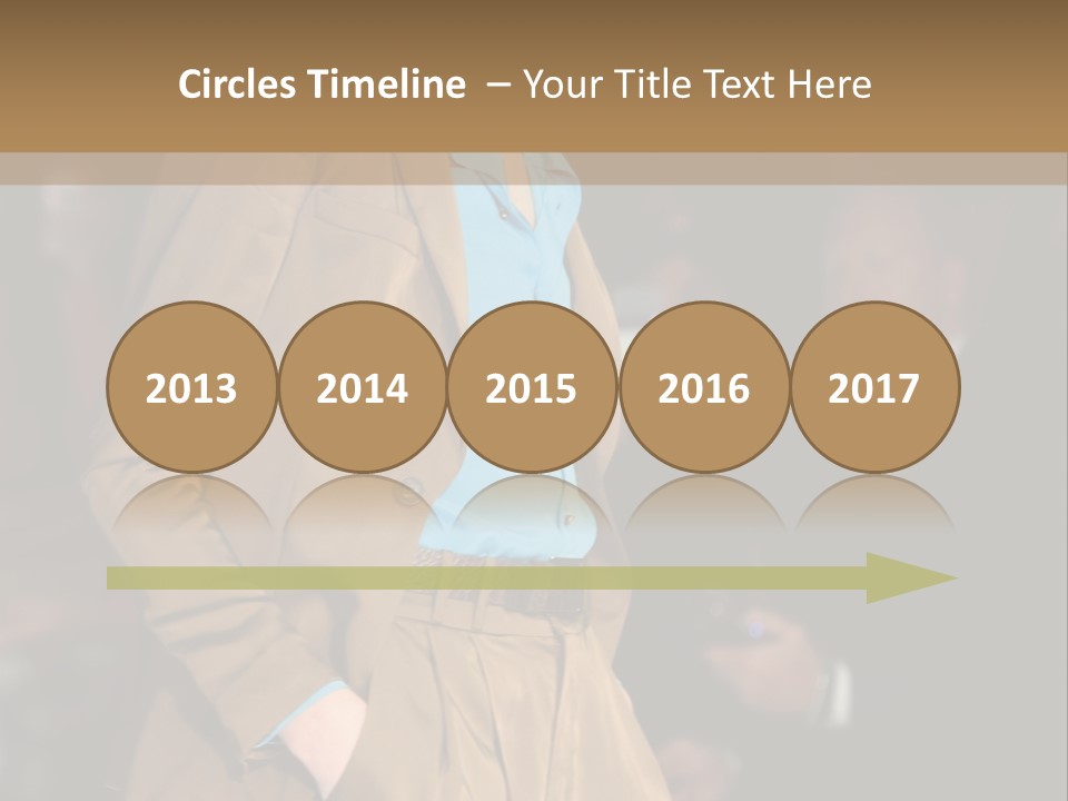 A Woman Walking Down A Runway In A Suit PowerPoint Template