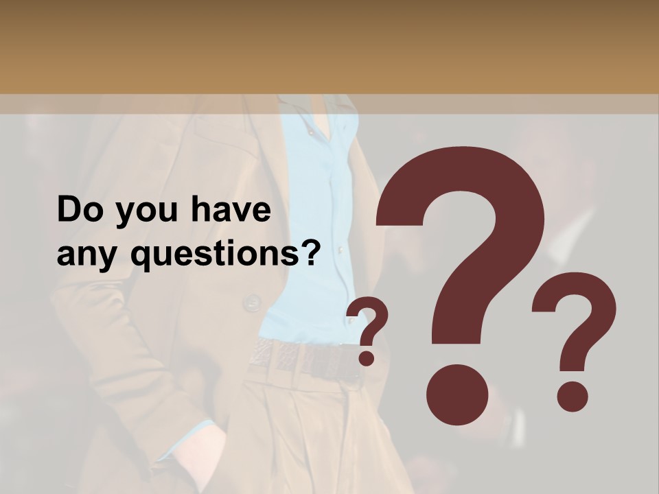 A Woman Walking Down A Runway In A Suit PowerPoint Template