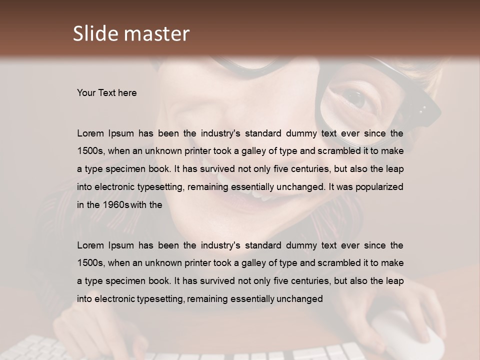 A Young Man Wearing Glasses Is Typing On A Keyboard PowerPoint Template
