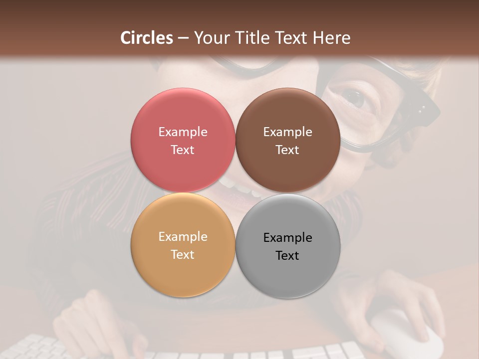 A Young Man Wearing Glasses Is Typing On A Keyboard PowerPoint Template