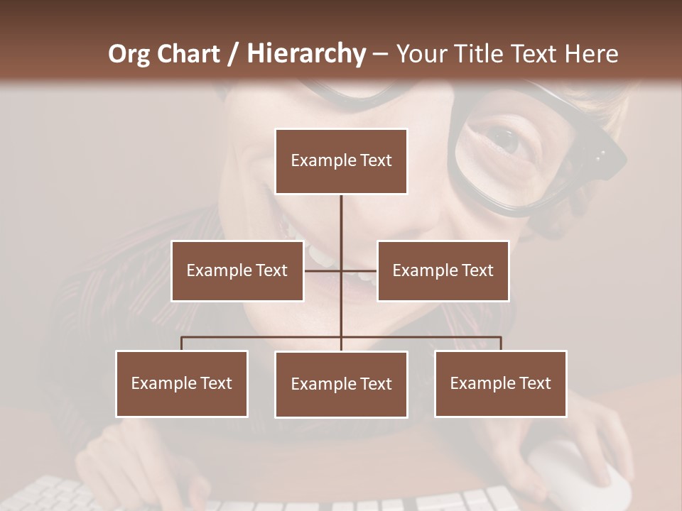 A Young Man Wearing Glasses Is Typing On A Keyboard PowerPoint Template
