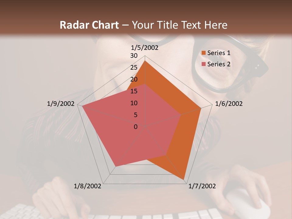 A Young Man Wearing Glasses Is Typing On A Keyboard PowerPoint Template