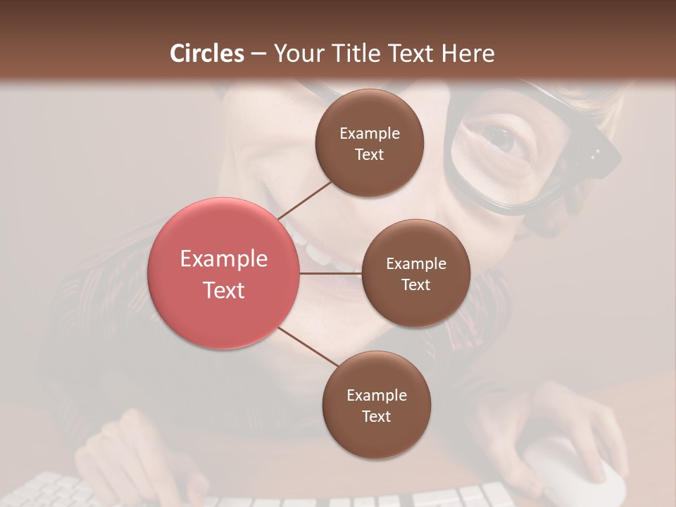 A Young Man Wearing Glasses Is Typing On A Keyboard PowerPoint Template