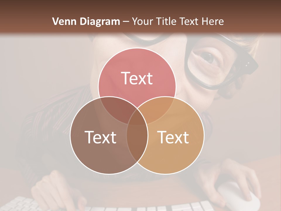 A Young Man Wearing Glasses Is Typing On A Keyboard PowerPoint Template