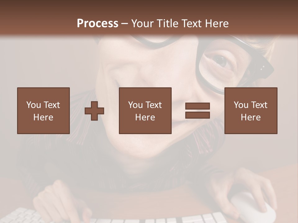 A Young Man Wearing Glasses Is Typing On A Keyboard PowerPoint Template