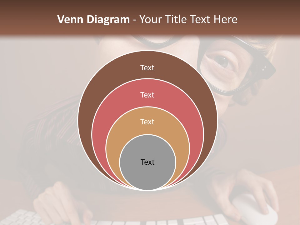 A Young Man Wearing Glasses Is Typing On A Keyboard PowerPoint Template