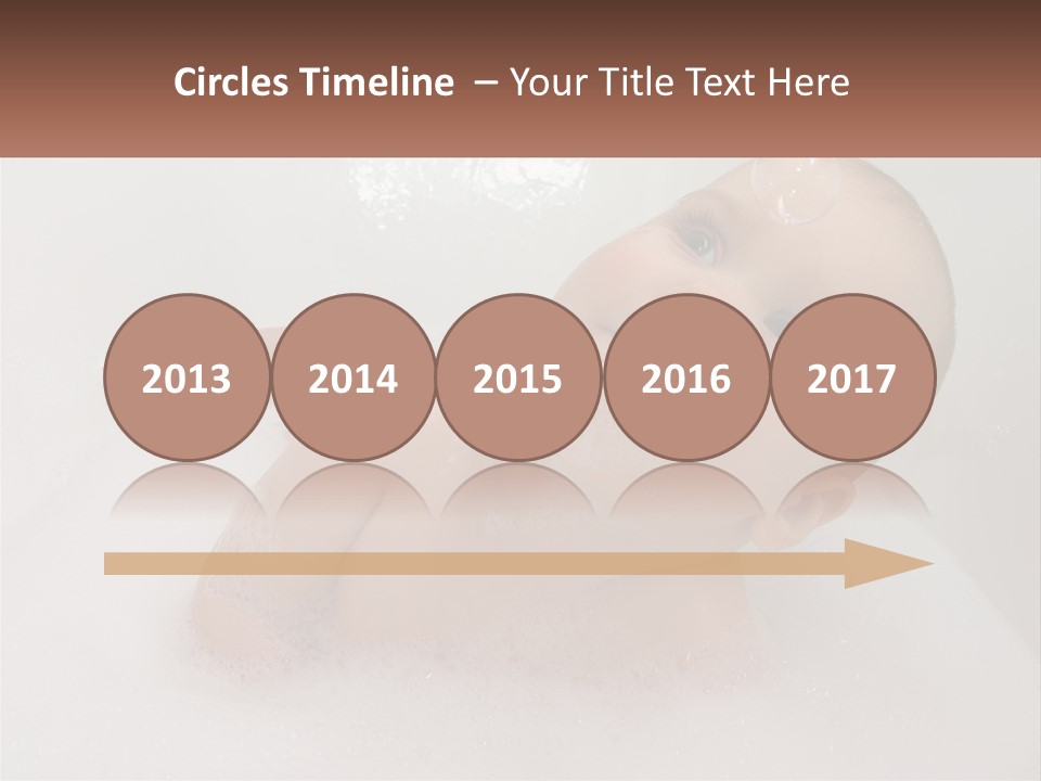 A Baby In A Bathtub With Bubbles Of Water PowerPoint Template
