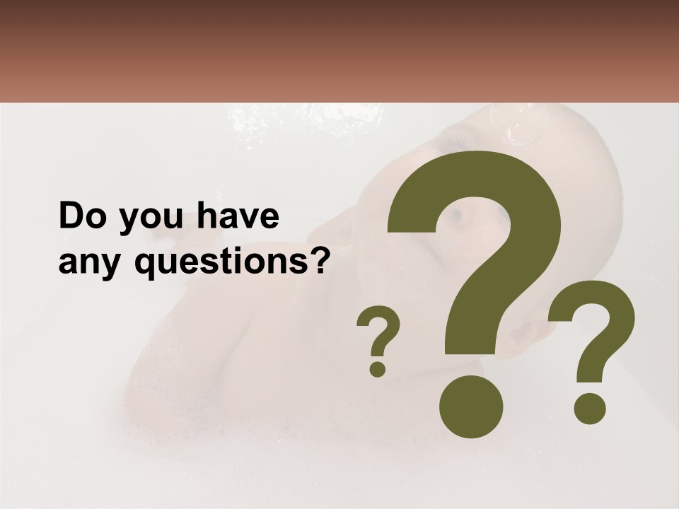 A Baby In A Bathtub With Bubbles Of Water PowerPoint Template
