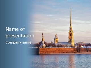 A Large Body Of Water With A Building In The Background PowerPoint Template