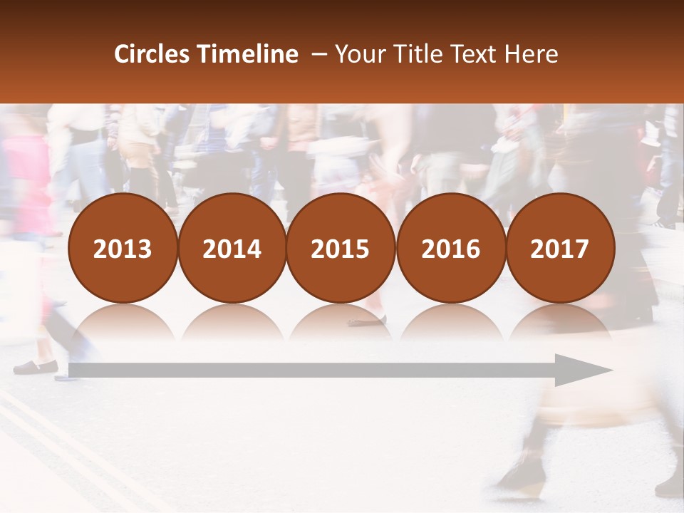 A Crowd Of People Walking Across A Street PowerPoint Template