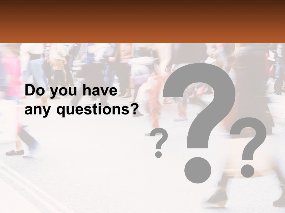 A Crowd Of People Walking Across A Street PowerPoint Template