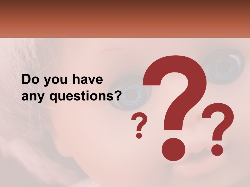 A Close Up Of A Doll With Blue Eyes PowerPoint Template