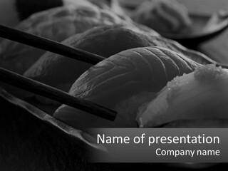 A Plate Of Sushi With Chopsticks On It PowerPoint Template