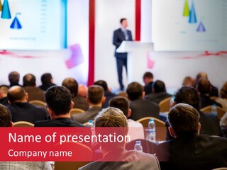 A Man Giving A Presentation To A Group Of People PowerPoint Template