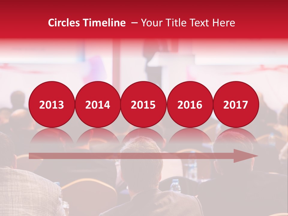 A Man Giving A Presentation To A Group Of People PowerPoint Template