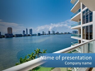 A View Of A Body Of Water From A Balcony PowerPoint Template