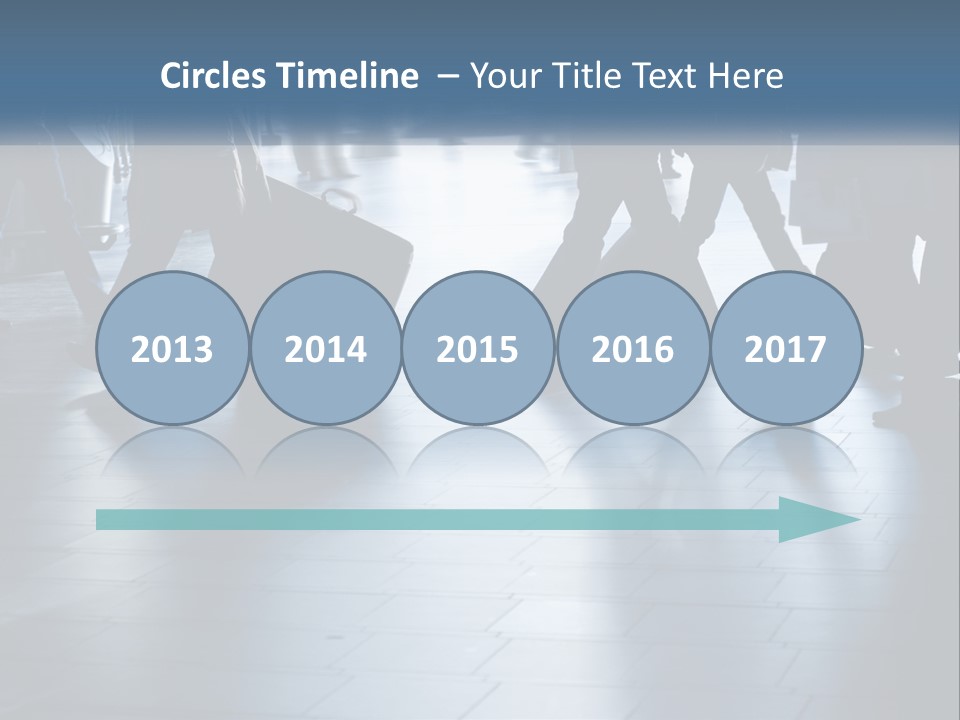 A Group Of People Walking Through A Train Station PowerPoint Template