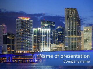 A City Skyline At Night With A Blue Banner In The Foreground PowerPoint Template
