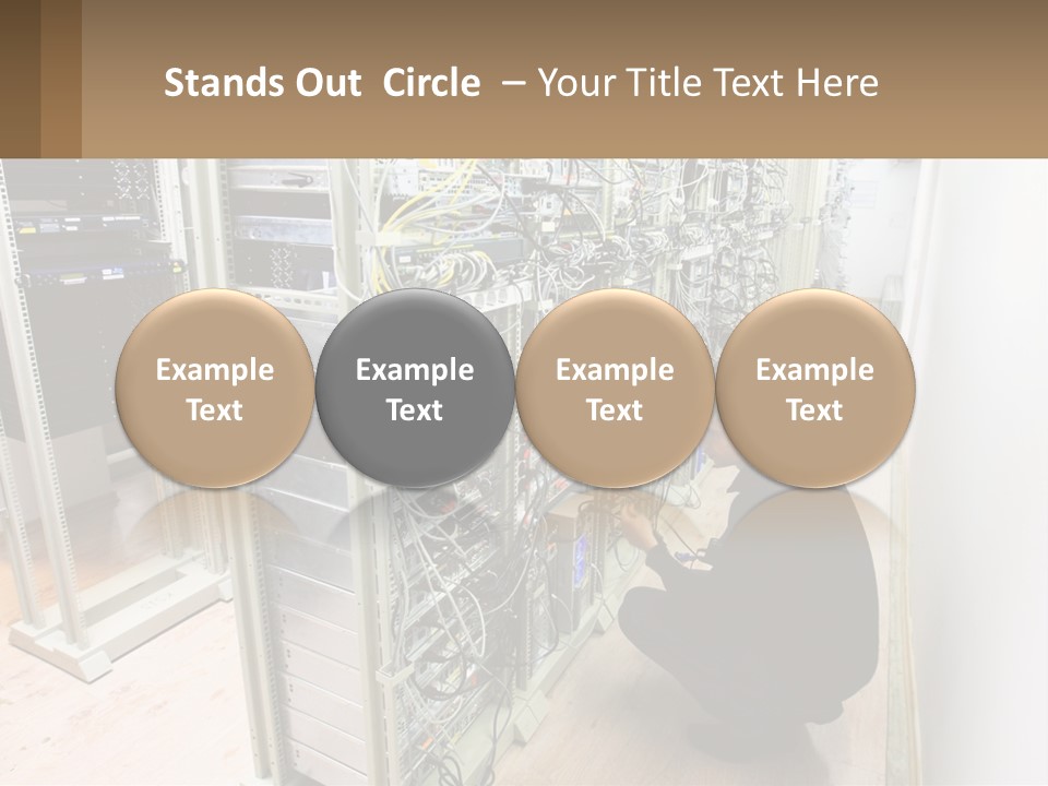A Man Sitting On The Floor In Front Of A Server PowerPoint Template
