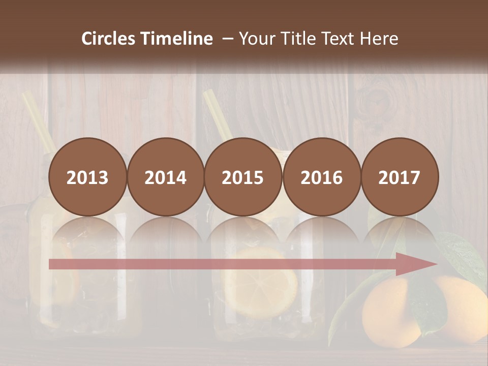 Two Mason Jars With Lemons And Mints On A Wooden Table PowerPoint Template