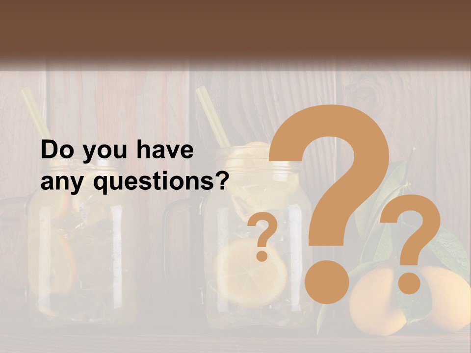 Two Mason Jars With Lemons And Mints On A Wooden Table PowerPoint Template