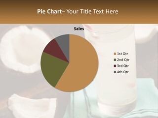 A Glass Of Water Next To Some Coconuts On A Table PowerPoint Template