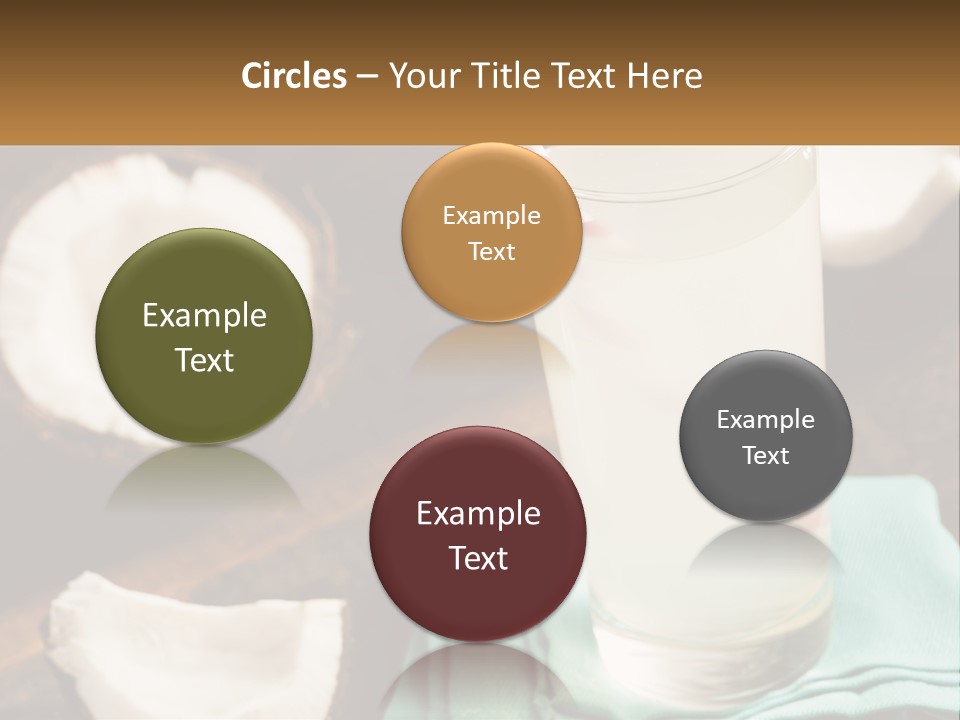 A Glass Of Water Next To Some Coconuts On A Table PowerPoint Template