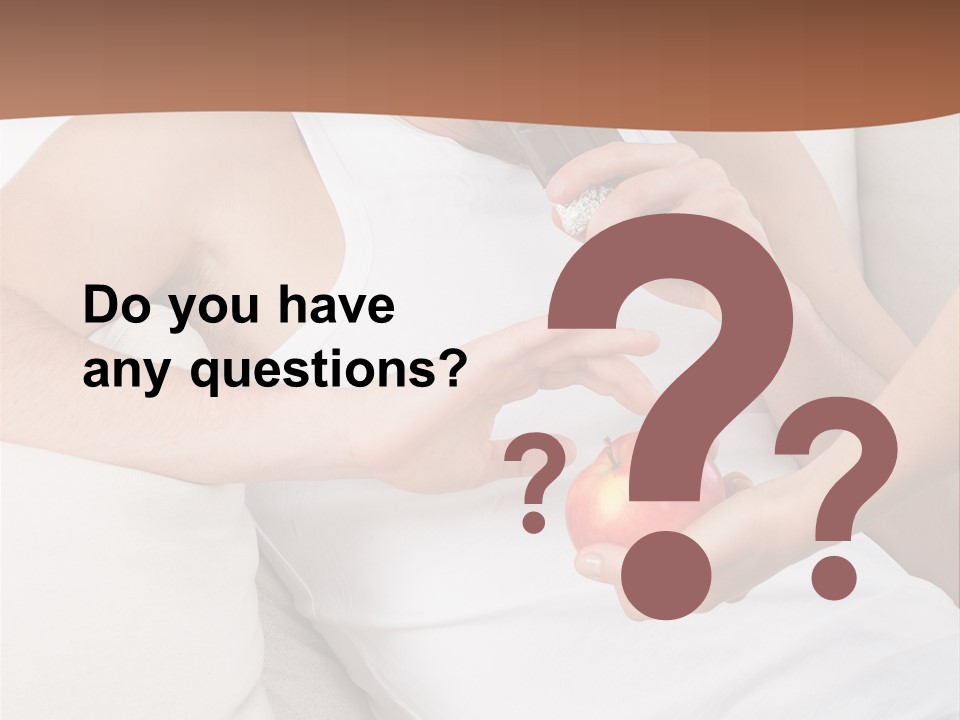 A Man Sitting On A Couch Eating An Apple PowerPoint Template
