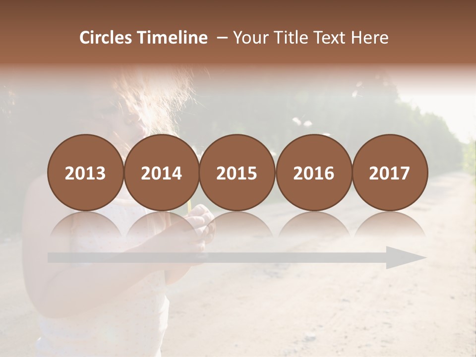 A Little Girl Blowing A Dandelion On A Dirt Road PowerPoint Template