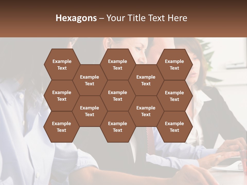 A Group Of People Sitting At A Table Working On A Computer PowerPoint Template