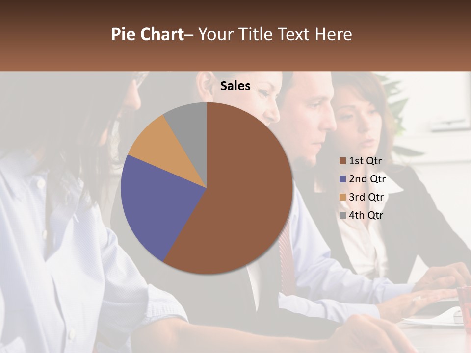 A Group Of People Sitting At A Table Working On A Computer PowerPoint Template