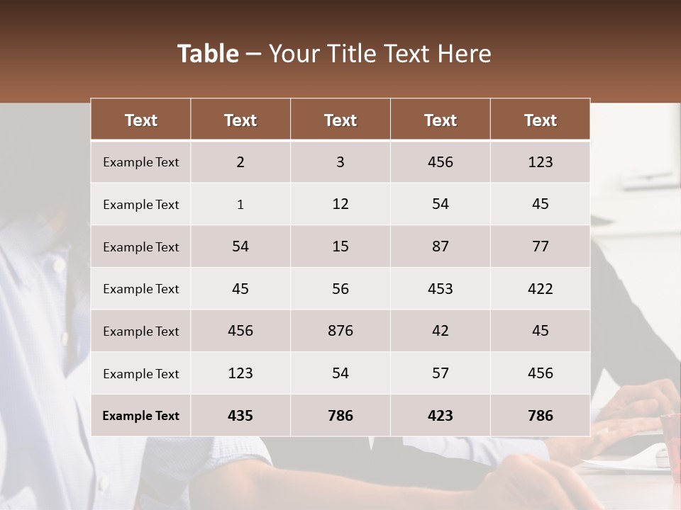A Group Of People Sitting At A Table Working On A Computer PowerPoint Template