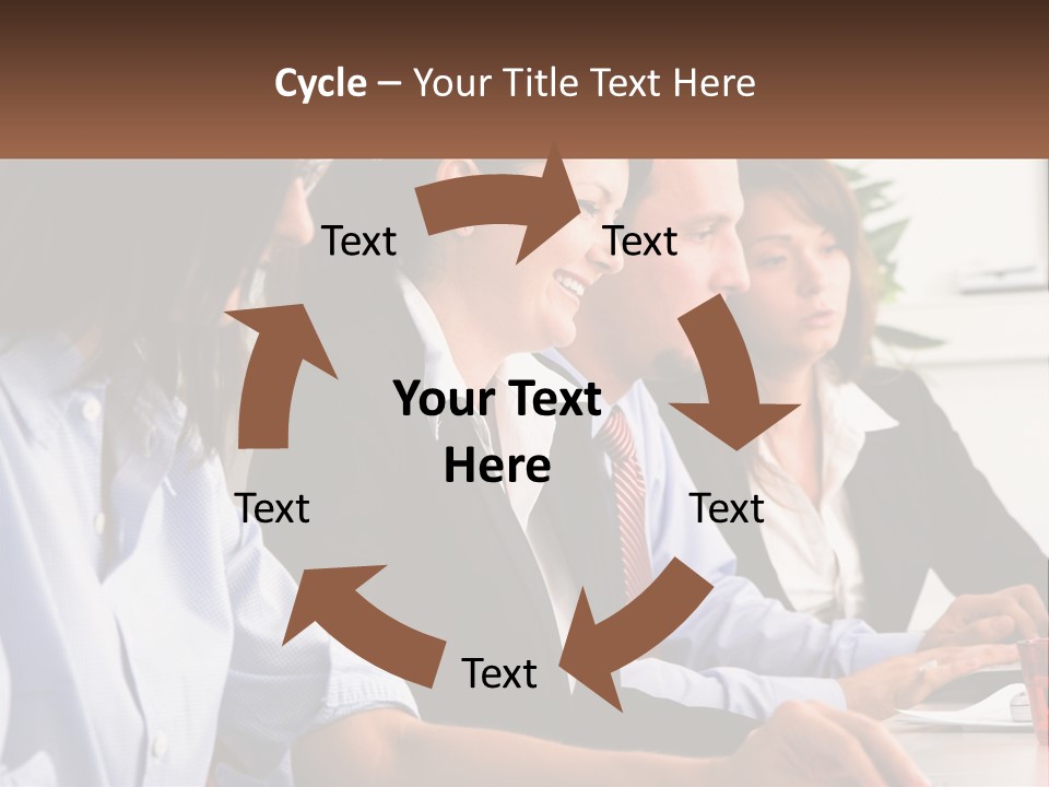 A Group Of People Sitting At A Table Working On A Computer PowerPoint Template