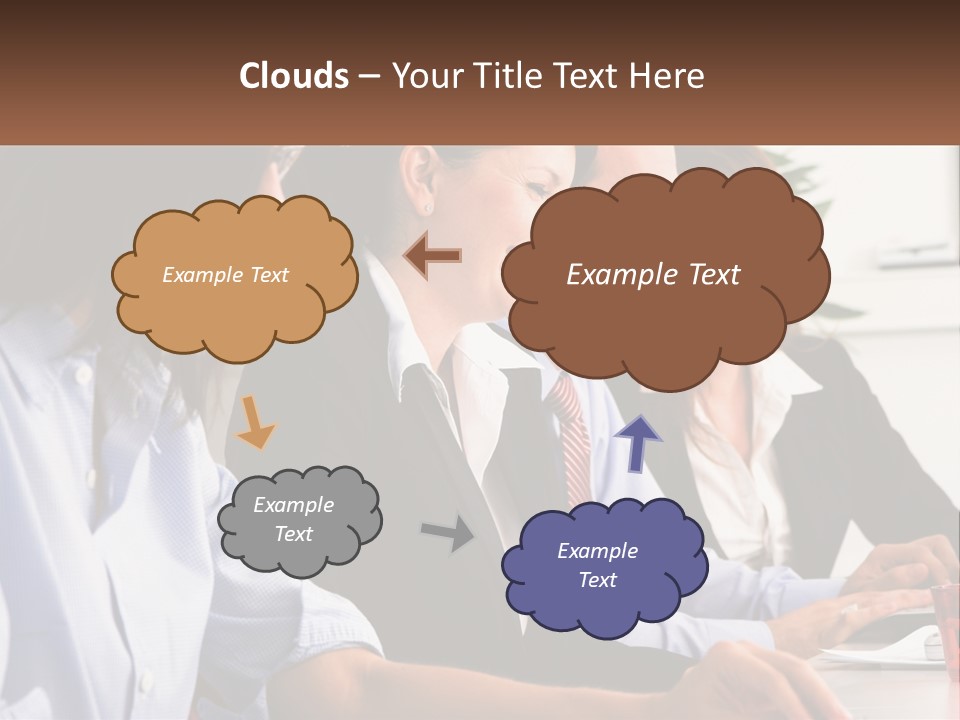 A Group Of People Sitting At A Table Working On A Computer PowerPoint Template