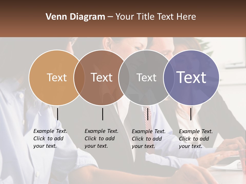A Group Of People Sitting At A Table Working On A Computer PowerPoint Template