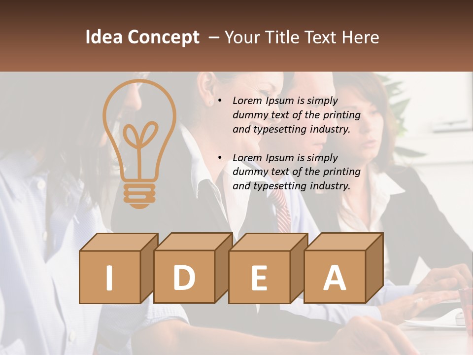 A Group Of People Sitting At A Table Working On A Computer PowerPoint Template